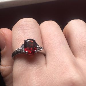 10k white gold oval garnet and diamond ring
